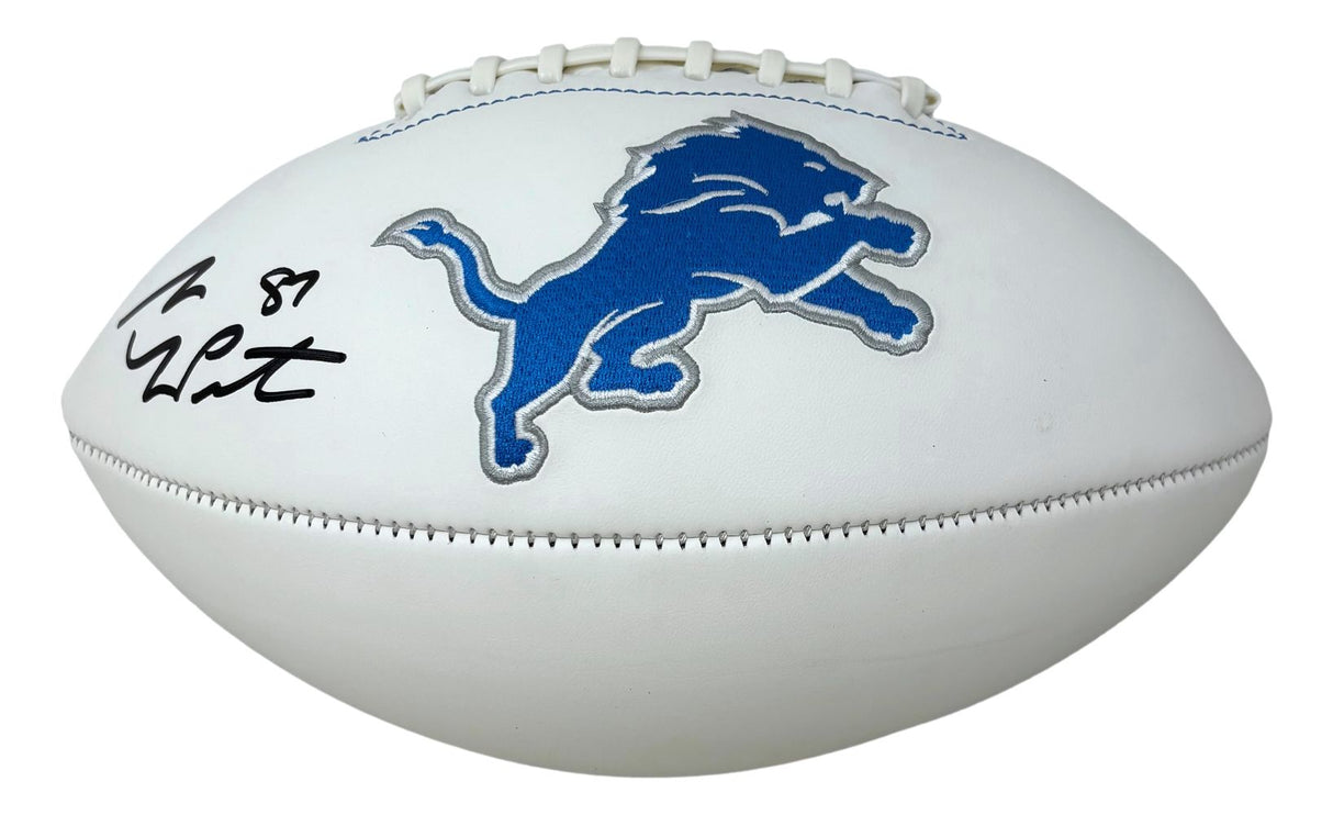 The Sports Integrity Sam LaPorta Signed Detroit Lions Logo Football features a white football with the team's blue lion logo in the center and Sam LaPorta's black signature with his number on the left side.