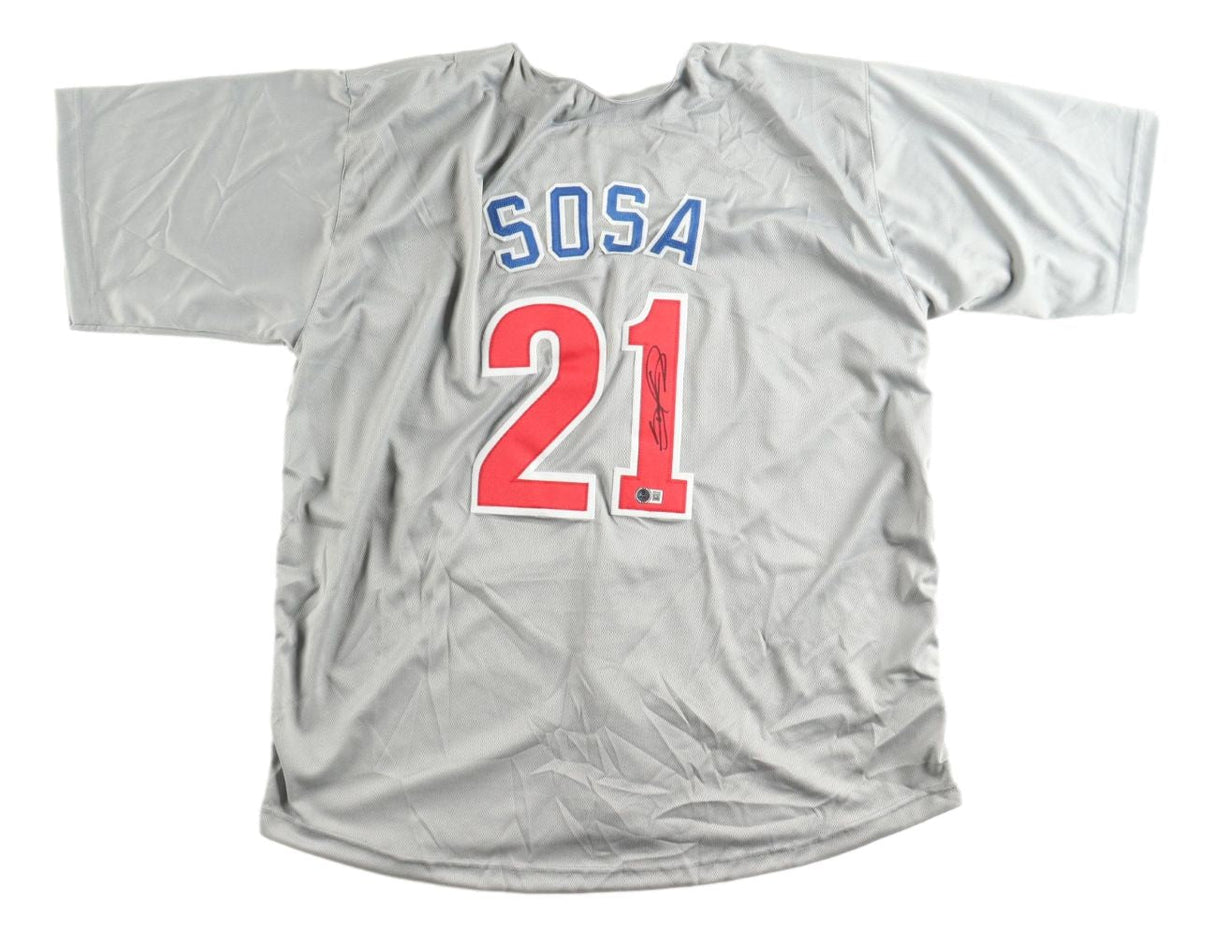 The Sports Integrity Sammy Sosa Chicago Signed Gray Baseball Jersey BAS features "SOSA" in blue, red number 21 on the back, and an autograph on the number 21 in black marker.