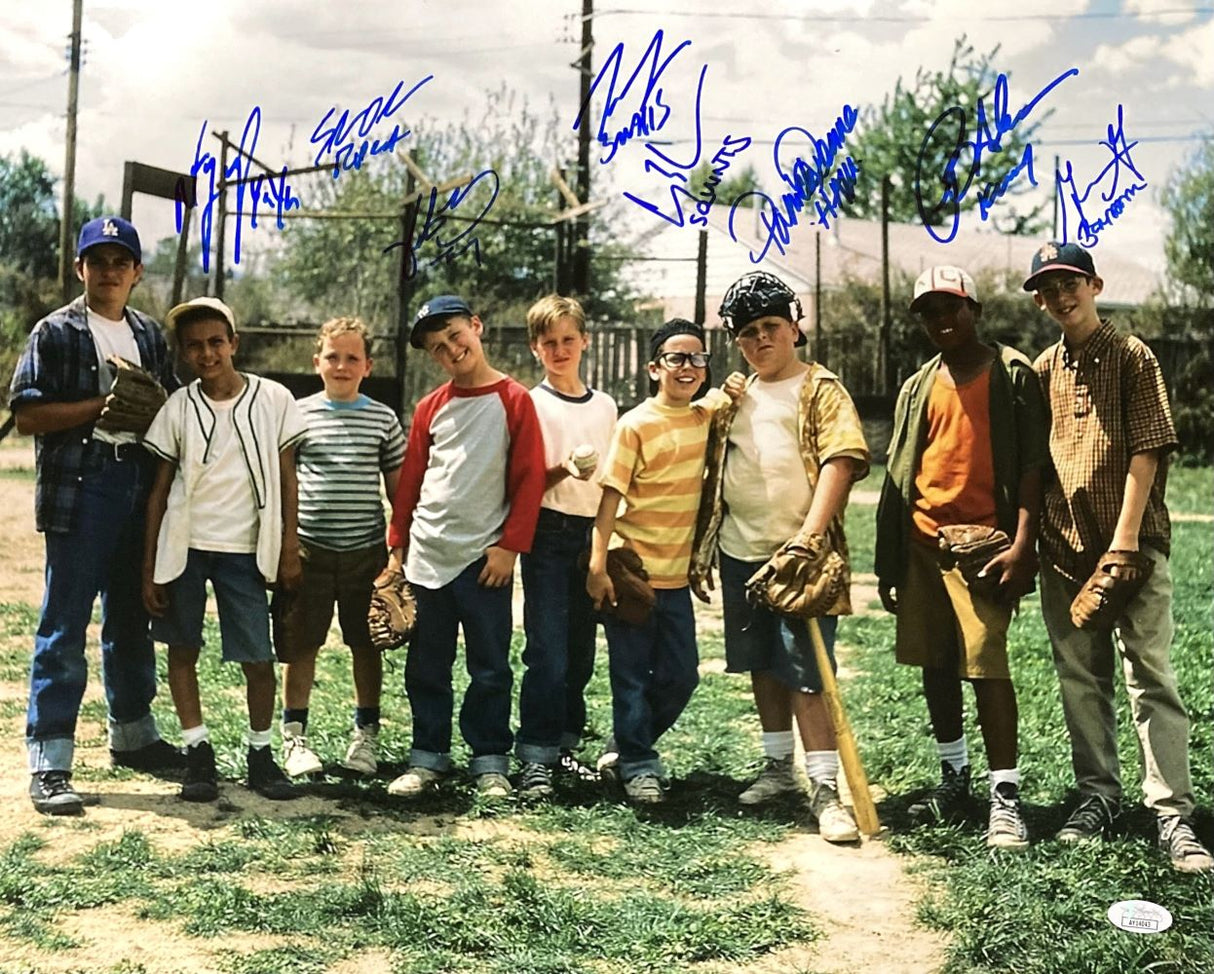 The Sandlot Cast Signed 16x20 Photo by Sports Integrity features Patrick Renna, Tom Guiry, and six others on a baseball field, some with gloves, hats, and a bat. The image displays several blue autographs. JSA certified.