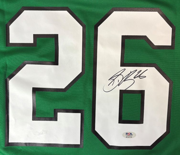 The Sports Integrity Saquon Barkley Signed Eagles Kelly Green Nike Game Replica Jersey features #26 in white with black outline, an autograph on the right digit in black ink, and a PSA/DNA authentication sticker below.