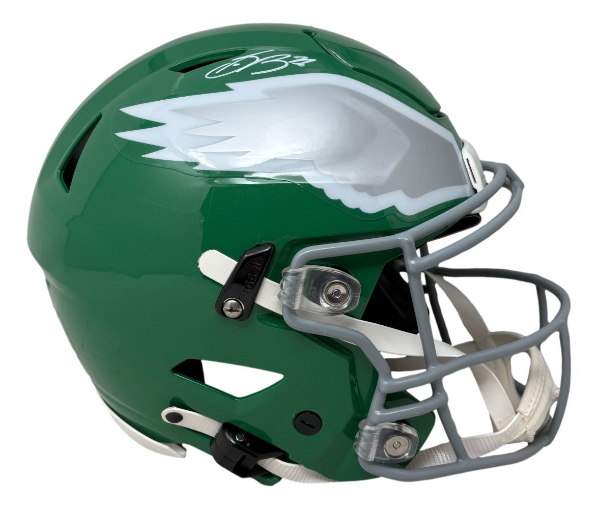 The Saquon Barkley Signed Eagles FS Kelly Green Authentic SpeedFlex Helmet by Sports Integrity features a silver wing design and gray facemask, representing the Philadelphia Eagles.