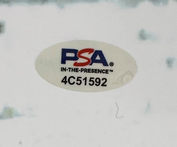 A white oval PSA sticker with red and blue logo, "IN-THE-PRESENCE™" text, and serial number 4C51592 appears on the Sports Integrity Saquon Barkley Signed 16x20 Eagles Snow Game vs Rams Photo (PSA/DNA ITP).
