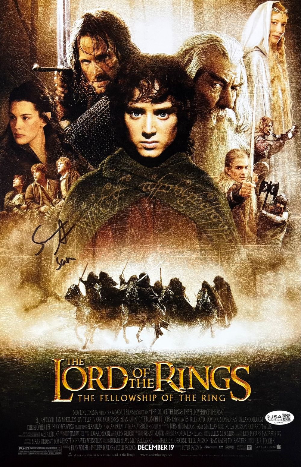 Sean Astin Signed 11x17 The Lord Of The Rings Fellowship Of The Ring Photo by Sports Integrity features the main characters above the fellowship on horseback, with the movie title at the bottom. JSA authenticated.