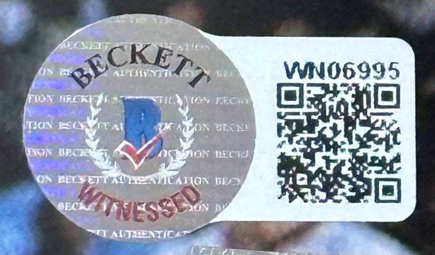 This Shaquille O'Neal Signed Framed 16x20 Lakers Jersey Photo by Sports Integrity includes a Beckett Authentication sticker featuring a holographic seal, QR code, serial number WN06995, and "WITNESSED" in red.