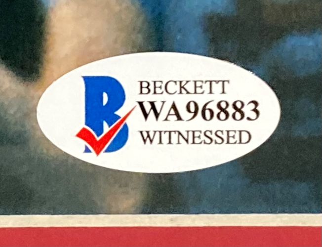 A Sugar Ray Leonard Signed Framed 16x20 Boxing Swing Photo by Sports Integrity, featuring a Beckett Witnessed sticker with a blue B, red check mark, and the identification code WA96883 in bold black text.