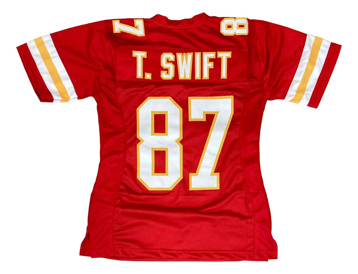 The Sports Integrity Taylor Swift Kansas City Red Ladies Football Jersey in women's size medium features yellow and white sleeve stripes, with "T. SWIFT" and the number 87 in bold white and yellow on the back.