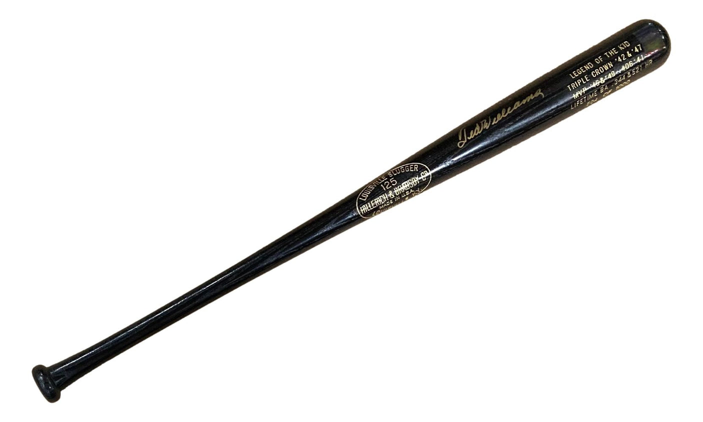 A Ted Williams Boston Red Sox Signed LS Legend Of The Kid Bat (LE/1000) by Sports Integrity, featuring black finish with gold writing and logo, is shown on a white background.