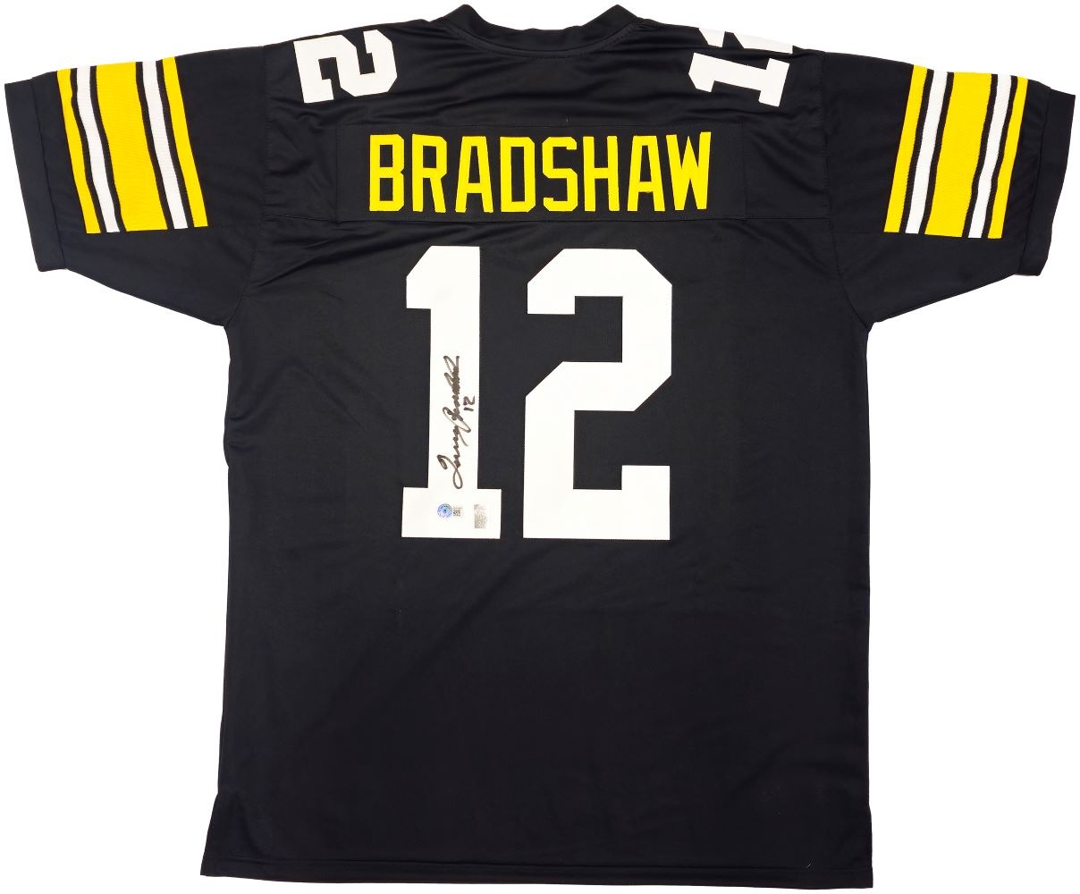 The Terry Bradshaw Pittsburgh Signed Black Football Jersey by Sports Integrity features yellow sleeve stripes, "BRADSHAW" in yellow above a large white autographed #12. BAS authenticated.