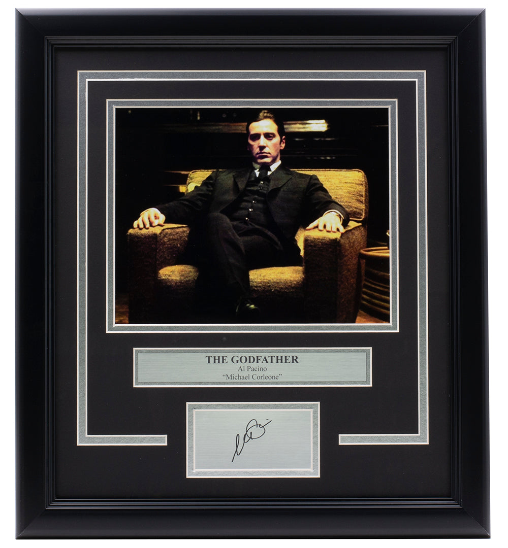 Sports Integrity's Al Pacino Framed 8x10 The Godfather Chair Photo features Michael Corleone seated, with a plaque and a laser-engraved signature displayed below.