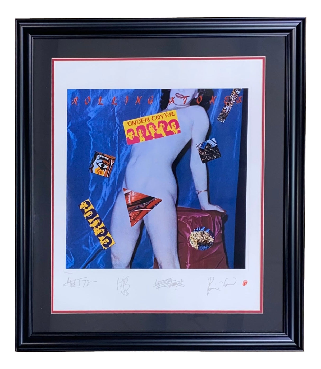 The Rolling Stones Framed 20x24 Under Cover Lithograph by Sports Integrity features a nude figure with a partially visible face, covered by colorful Rolling Stones graphics on blue, and includes four signatures at the bottom.