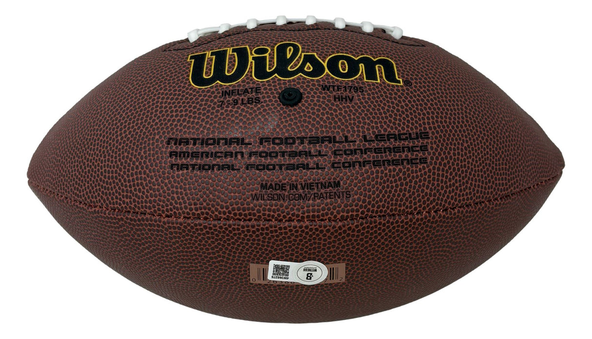 A Thurman Thomas Buffalo Bills signed NFL Wilson Super Grip football by Sports Integrity, featuring the signature on the textured surface along with brand and league details.