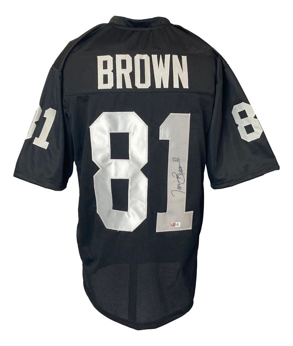 The Sports Integrity Tim Brown Oakland Signed Black Football Jersey features "BROWN" and the number 81 in white on the back and sleeves, with Tim Brown's autograph on the back number.