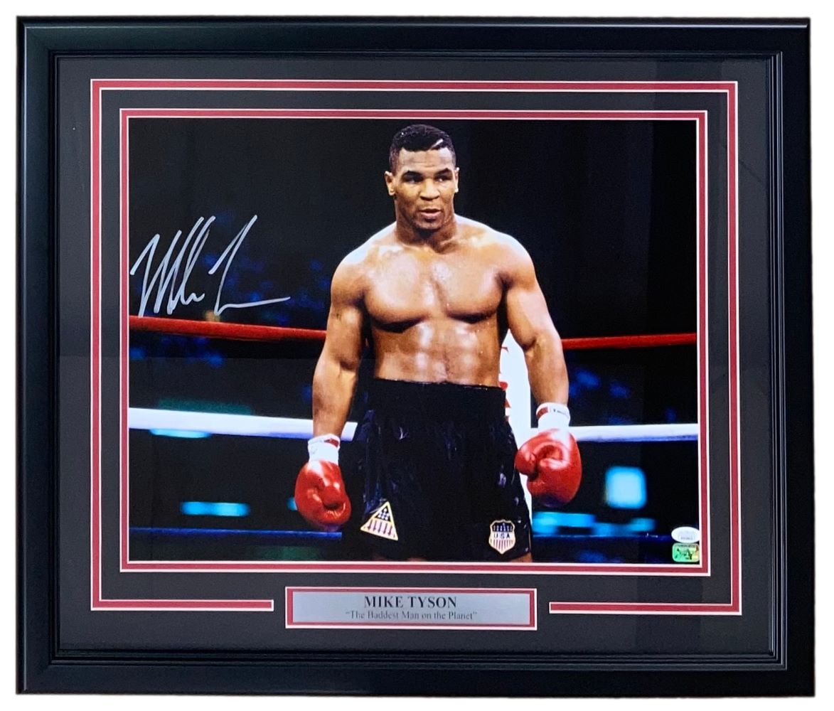 The Sports Integrity Mike Tyson Left Signed Framed 16x20 Boxing Stare Photo features Tyson in the ring with red gloves and black shorts, JSA authenticated signature in the top left, and a nameplate at the bottom.