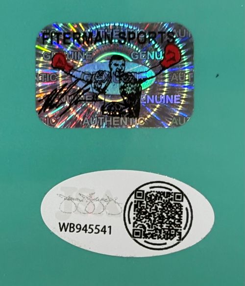 A Sports Integrity holographic sticker with boxer art and "GENUINE" appears above a white oval showing a signature, QR code, and WB945541 on teal for the Mike Tyson Signed Framed 16x20 Punch Out Boxing Photo w/ Controller JSA QR Holo.