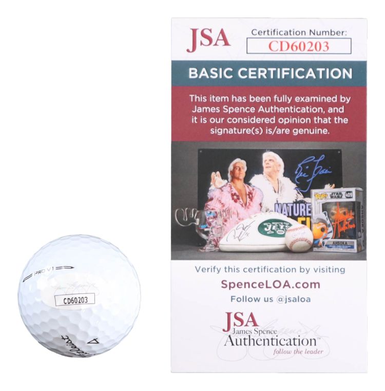 A Will Zalatoris Signed PGA Titleist Pro V1 Golf Ball from Sports Integrity with a CD60203 sticker is shown next to a JSA Basic Certification card featuring sports memorabilia images and autograph authenticity details.