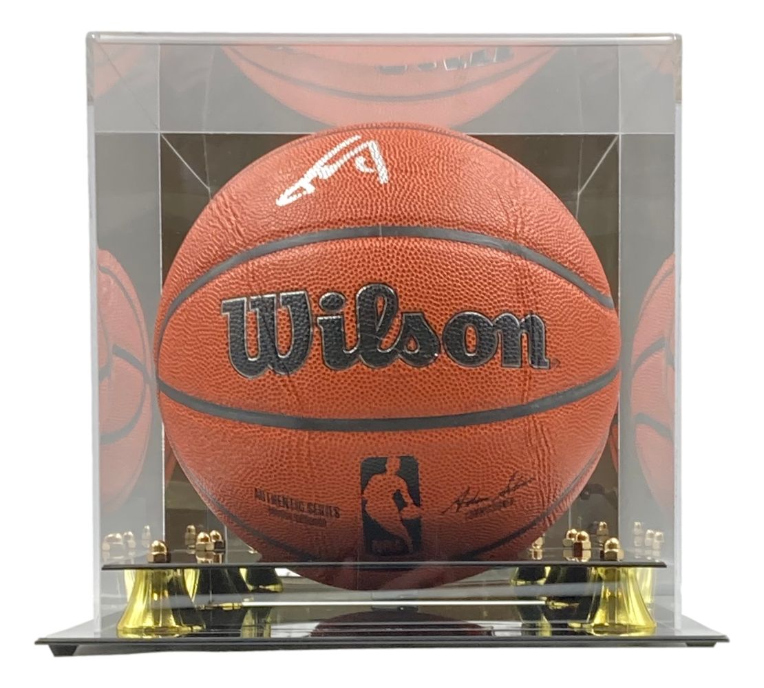 A Yao Ming Houston Rockets signed Wilson NBA basketball is showcased in a clear display case with gold-tone corners and a black base, offered by Sports Integrity.