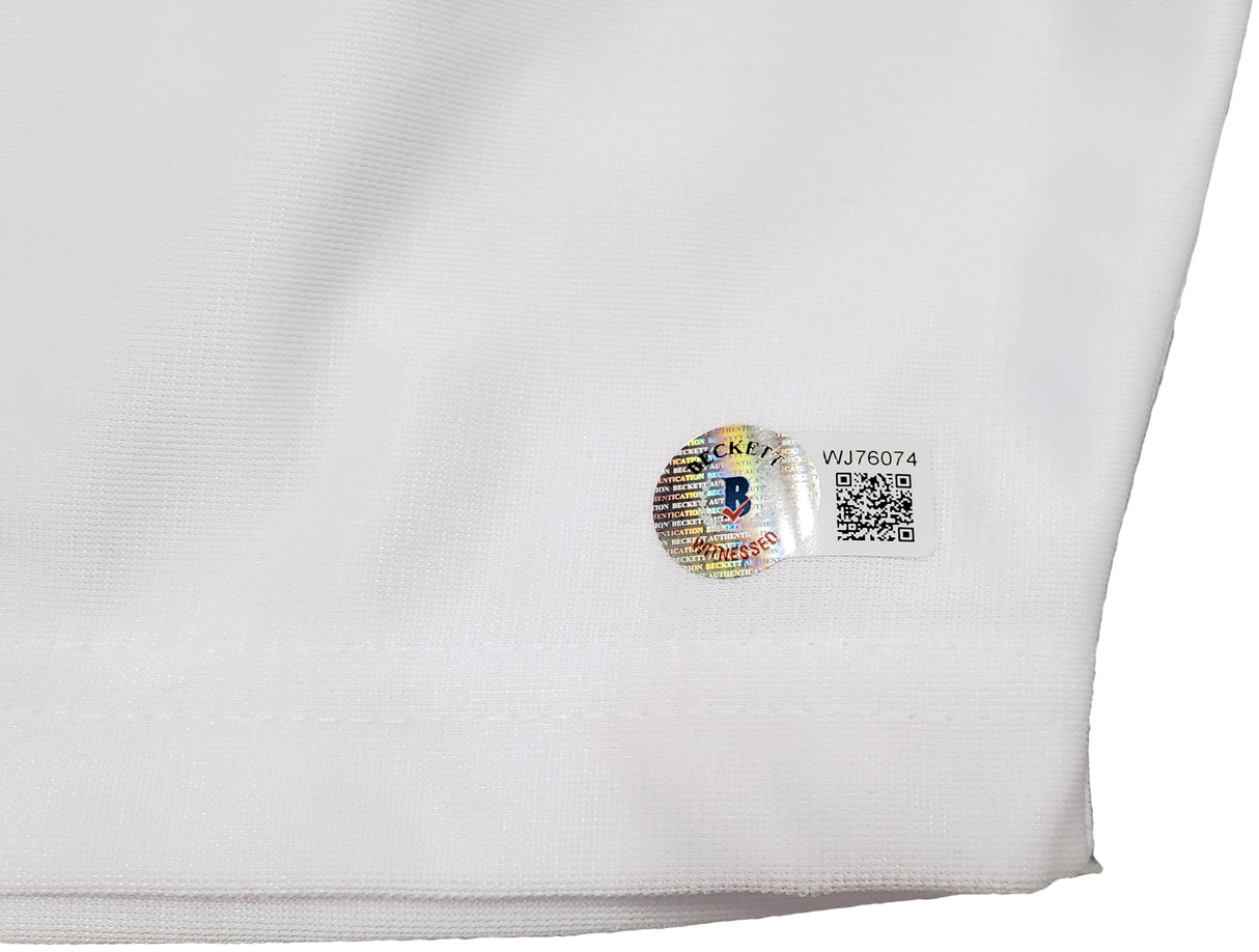 Jon Bones Jones Autographed White Boxing Trunks Beckett BAS QR Stock #200323