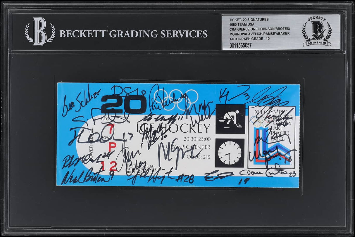A Beckett-graded Sports Integrity ticket signed by 20 is encased in plastic. It's for the USA vs. West Germany hockey game at the 1980 Winter Olympics and features blue, white, and Olympic ring graphics.