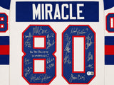 1980 Team USA Miracle on Ice Autographed Framed White Jersey "Do You Believe In Miracles?!" With 18 Signatures Including Eruzione & Craig Beckett BAS Witness Stock #262550