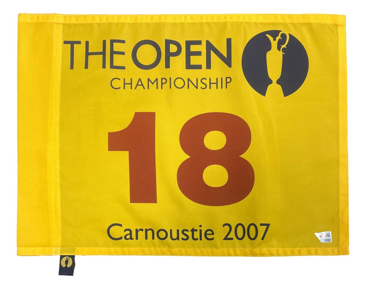 The Sports Integrity 2007 Open Championship Carnoustie PGA Issued Golf Flag by Fanatics features a yellow design, trophy icon and THE OPEN CHAMPIONSHIP at the top, bold red 18 in the center, and Carnoustie 2007 at the bottom.