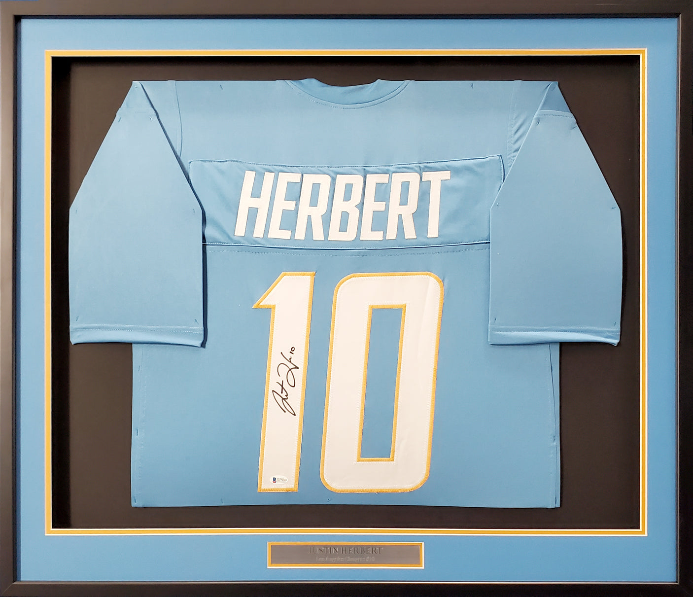 Los Angeles Chargers Justin Herbert Autographed Framed Powder Blue Jersey Beckett BAS Stock #191176