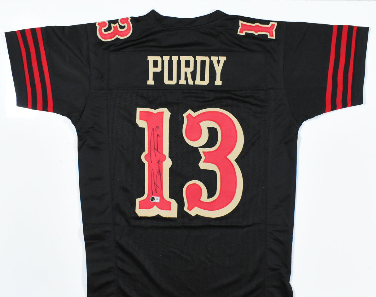 Brock Purdy Autographed Black Pro Style Jersey - Beckett W Hologram *Black