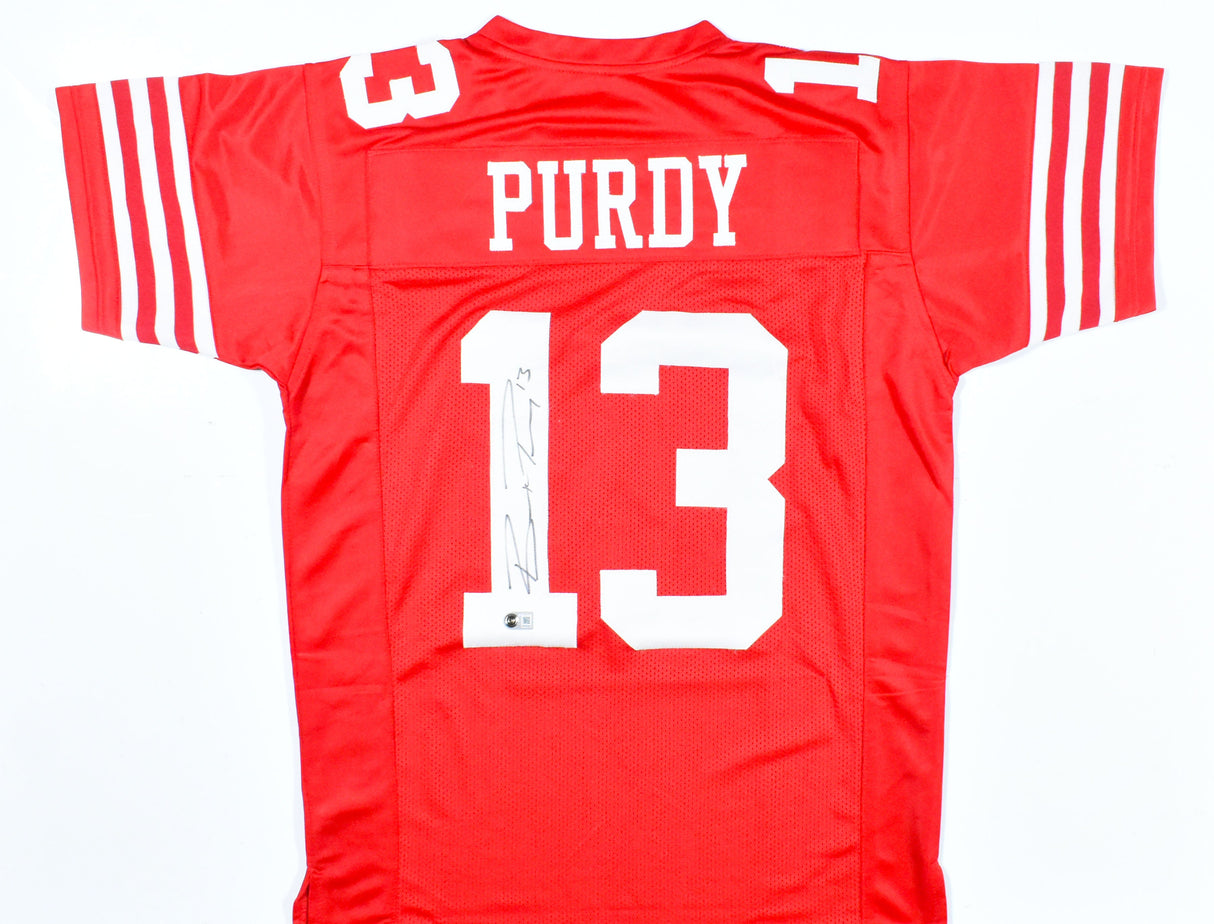 Brock Purdy Autographed Red Pro Style Jersey - Beckett W Hologram *Black