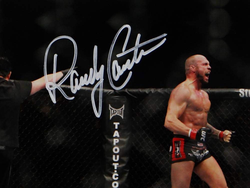 Randy Couture Signed MMA 8x10 Photo With Belt- Beckett Auth *Ref Back Turned
