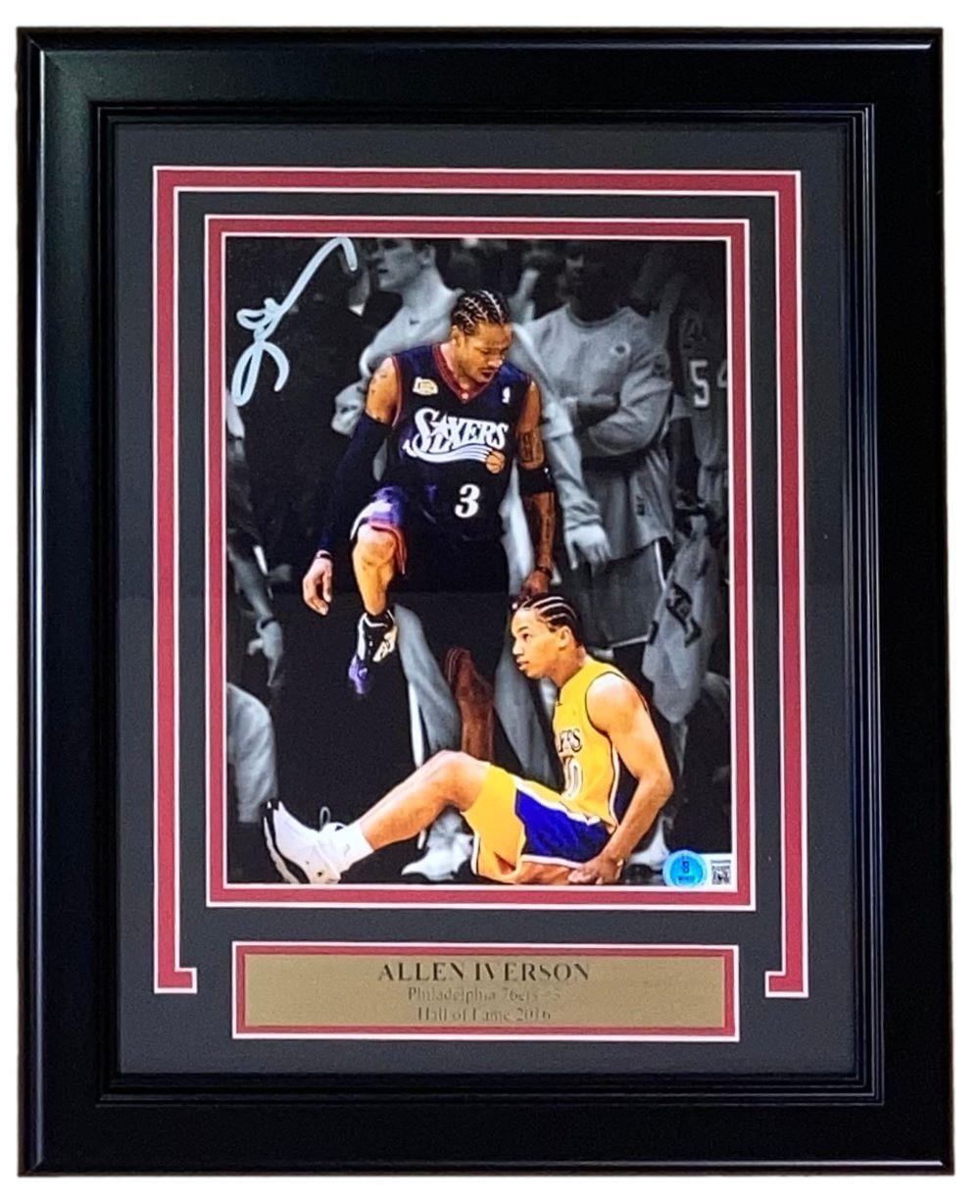 The Sports Integrity Allen Iverson Signed Framed 8x10 Philadelphia 76ers Step Over Lue Photo features Iverson's autograph and comes with a plaque noting his Hall of Fame career.