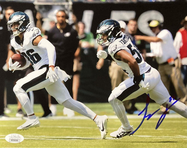 The Sports Integrity Jeremiah Trotter Jr Signed 8x10 Philadelphia Eagles Blocking Photo (JSA) shows two players in white uniforms running on the field, with one carrying the ball and an autograph in blue ink.