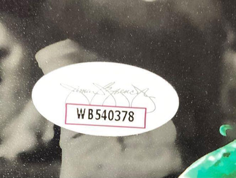 A Jeremiah Trotter Jr signed 8x10 Eagles Spotlight photo by Sports Integrity features a white oval JSA sticker with serial WB540378 and a cursive signature on a blurred black-and-white background.