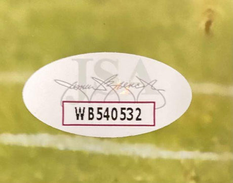 Sports Integrity’s Jeremiah Trotter Jr Signed 11x14 Philadelphia Eagles Photo includes an oval authentication sticker with code WB540532 and a printed signature on a green and white sports field background.