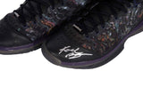 A close-up of the Nike Zoom Kobe III Prelude Shoes, signed by Kobe Bryant, featuring black and purple details. Sold by Sports Integrity.