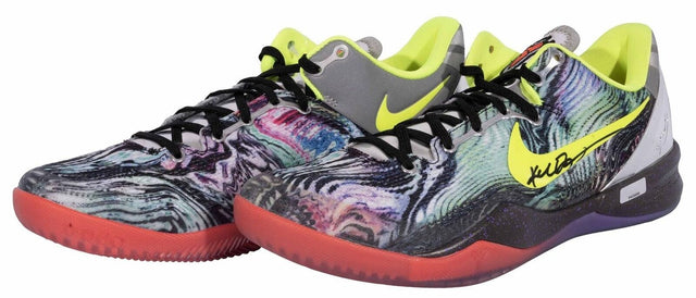 A pair of Kobe Bryant Lakers Signed Nike Zoom Kobe 8 System Prelude sneakers by Sports Integrity, featuring multicolor swirling patterns, yellow Nike swooshes, neon inner lining, black laces, translucent red soles, and a signature on one shoe.