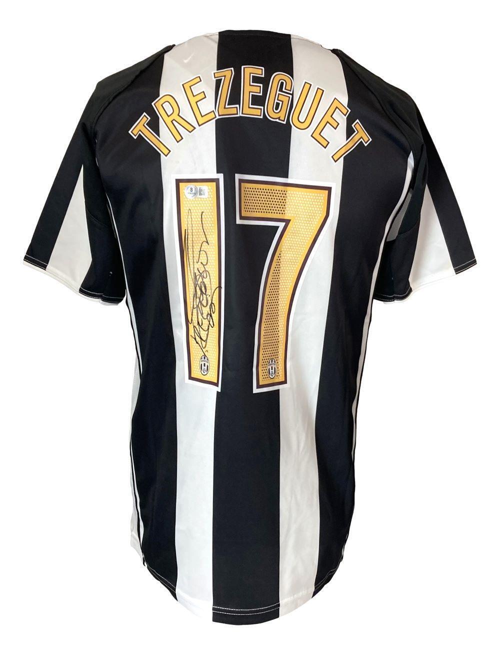 Sports Integrity David Trezeguet Signed Juventus Nike Soccer Jersey BAS features black and white colors, Trezeguet’s name and number 17 on the back, with his signature on the number.
