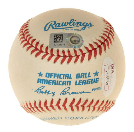 Sports Integrity Mickey Mantle Mike Trout Signed American League Baseball, features red stitching, "OFFICIAL BALL AMERICAN LEAGUE" in blue, Bobby Brown’s signature, and JSA authentication sticker Z95954 attached.