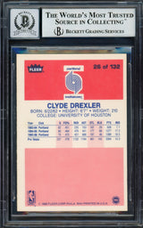Clyde Drexler Autographed 1986-87 Fleer Rookie Card #26 Portland Trail Blazers Auto Grade Gem Mint 10 "The Glide" Beckett BAS #14127408