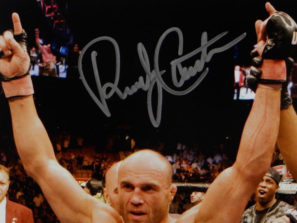 Randy Couture Autographed MMA 8x10 Photo With Belt- Beckett Auth *Silver