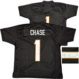 Cincinnati Bengals Ja'Marr Chase Autographed Black Jersey Beckett BAS Witness Stock #220612