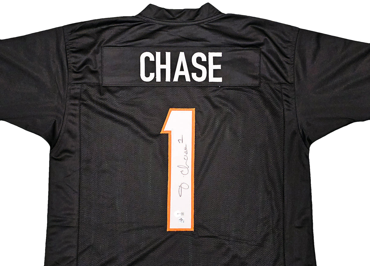 Cincinnati Bengals Ja'Marr Chase Autographed Black Jersey Beckett BAS Witness Stock #220612