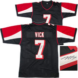 Atlanta Falcons Michael Vick Autographed Black Jersey Beckett BAS Witness Stock #253383
