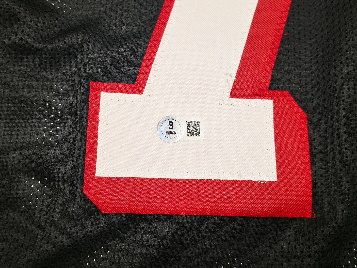 Atlanta Falcons Michael Vick Autographed Black Jersey Beckett BAS Witness Stock #253383