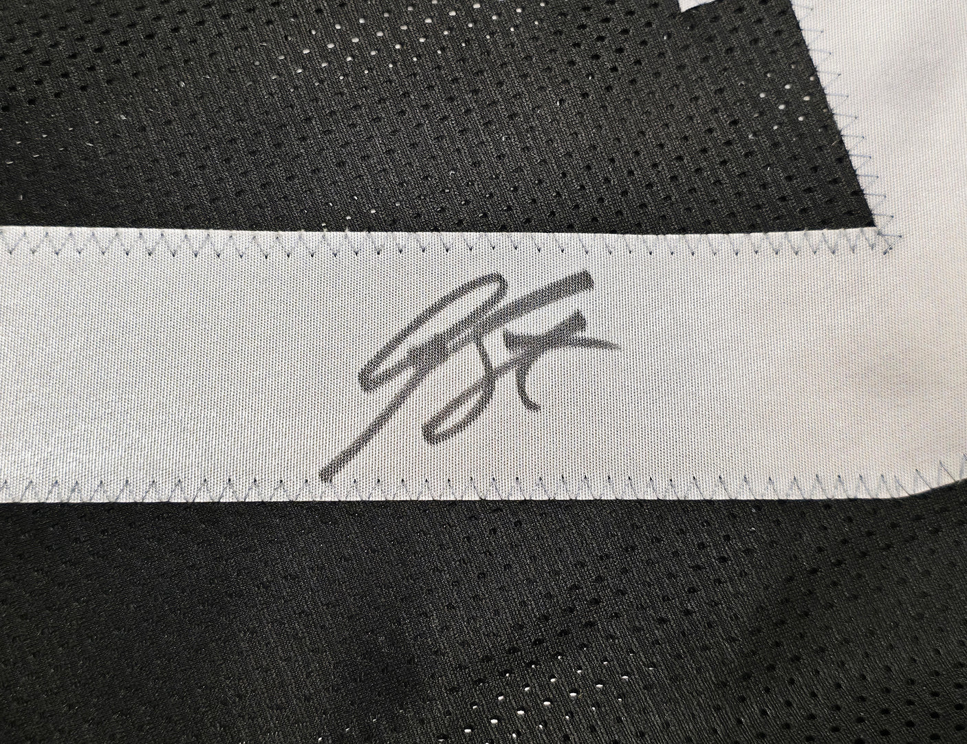 Las Vegas Raiders Geno Smith Autographed Black Jersey Beckett BAS Witness Stock #253486