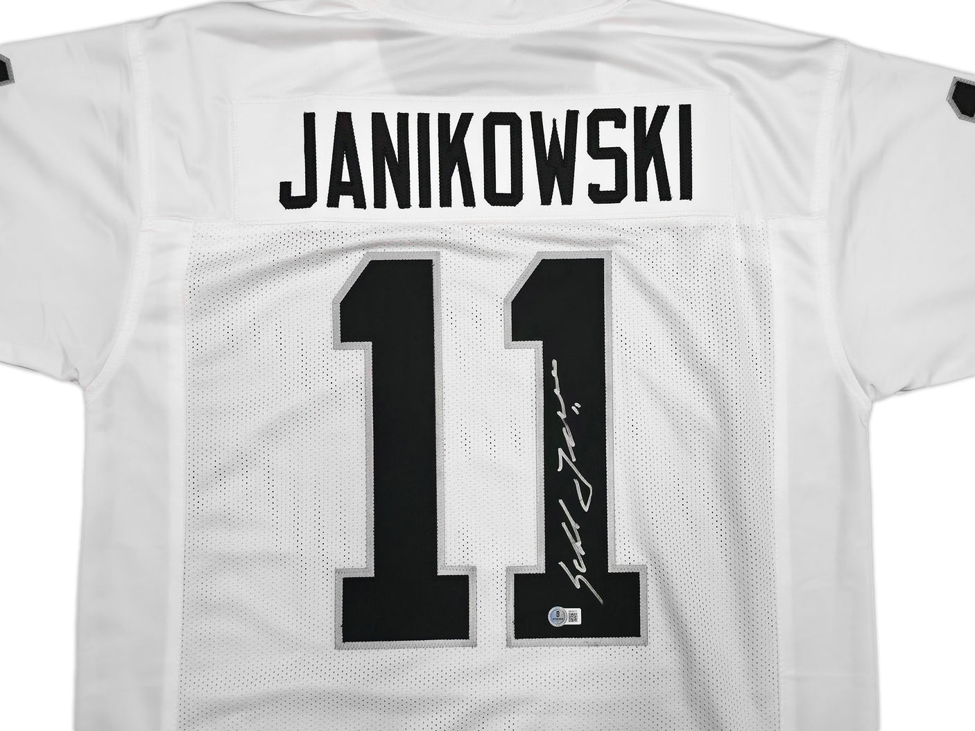 Oakland Raiders Sebastian Janikowski Autographed White Jersey Beckett BAS QR Stock #253390