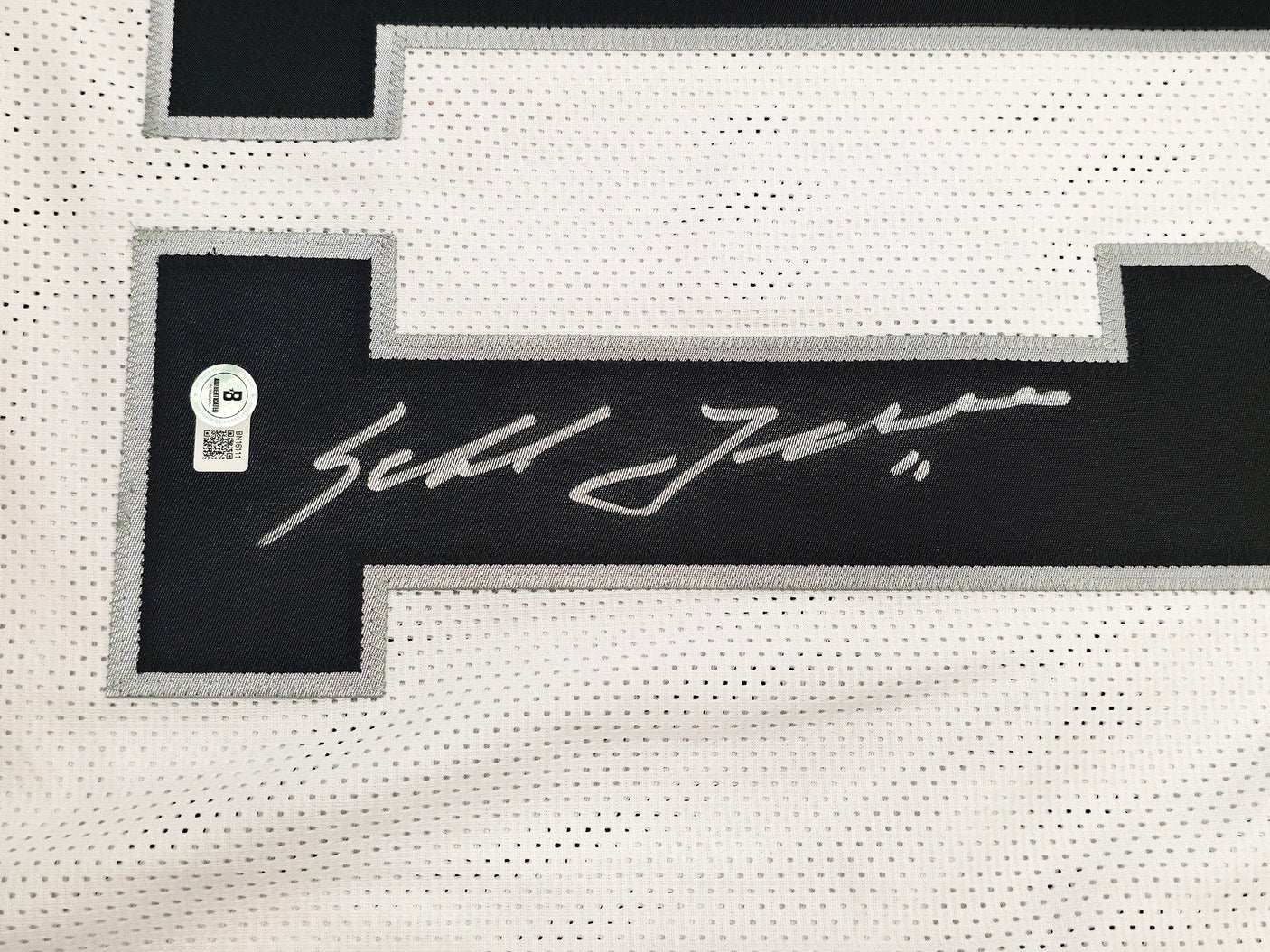 Oakland Raiders Sebastian Janikowski Autographed White Jersey Beckett BAS QR Stock #253390