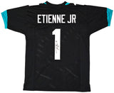 Jacksonville Jaguars Travis Etienne Autographed Black Jersey Beckett BAS Witness Stock #220898
