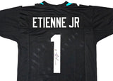 Jacksonville Jaguars Travis Etienne Autographed Black Jersey Beckett BAS Witness Stock #220898