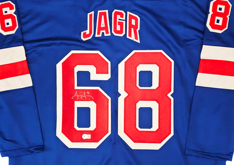 New York Rangers Jaromir Jagr Autographed Blue, Red & White Jersey Beckett BAS Witness Stock #221070