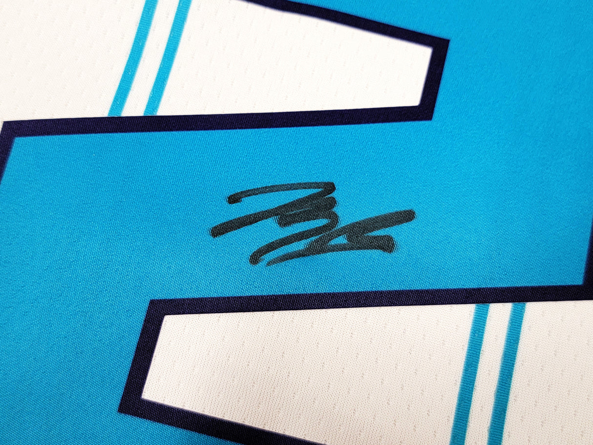 Charlotte Hornets LaMelo Ball Autographed White Nike Swingman Jersey Size L Beckett BAS QR Stock #209486