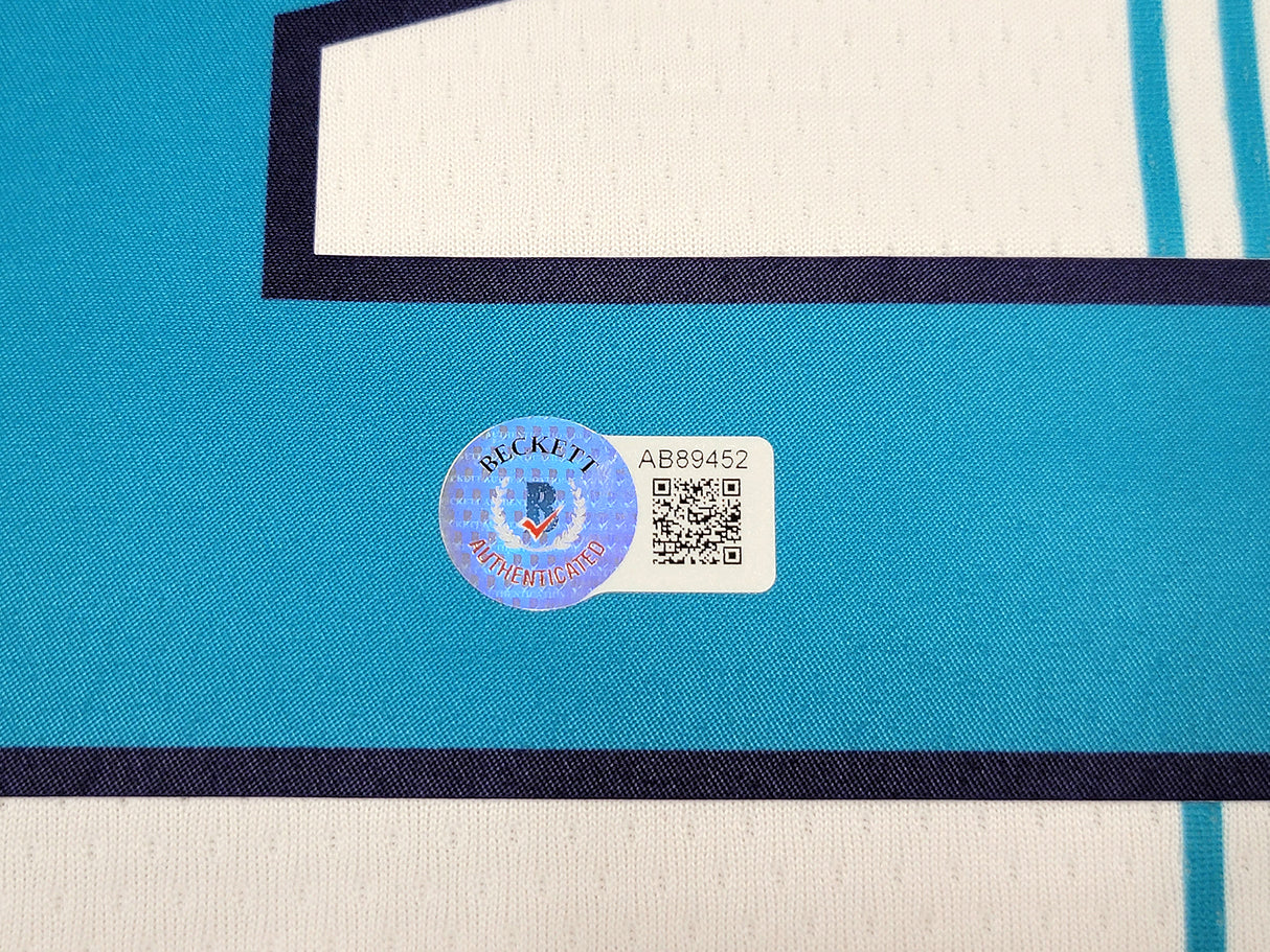 Charlotte Hornets LaMelo Ball Autographed White Nike Swingman Jersey Size XXL Beckett BAS QR Stock #209488